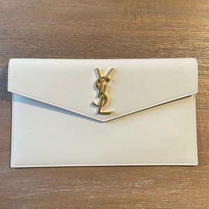 New Beige Saint Laurent clutch with tags
